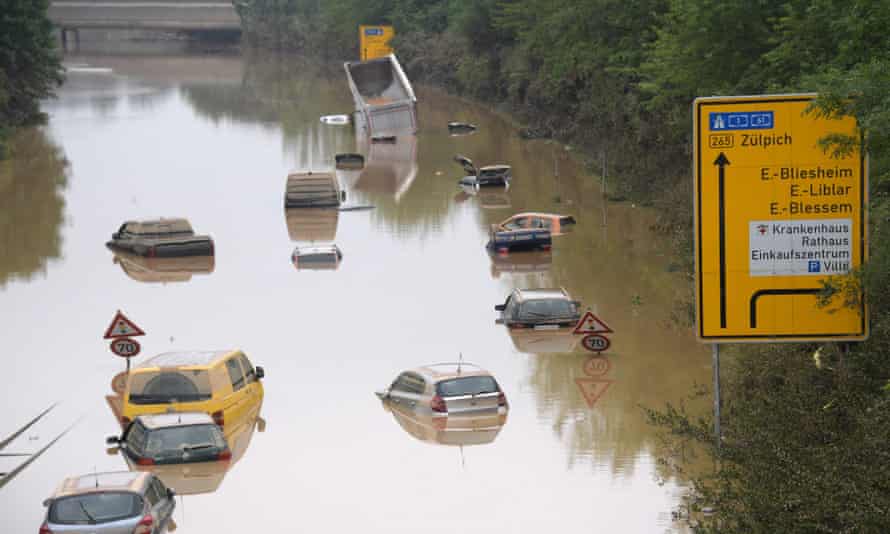 Submerged cars and other vehicles seen after flooding in Erftstadt, western Germany