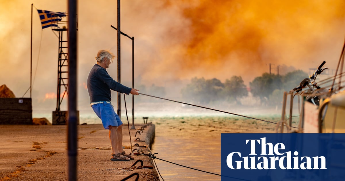 Greece wildfires: woman charged with unintentional arson after cigarette allegedly started blaze on Chios