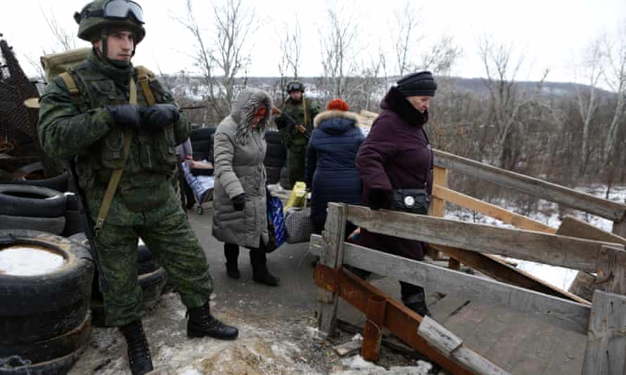 Civilians seen at Stanitsa Luganskaya, the only active checkpoint for them to cross the border between Ukraine and the Lugansk People’s Republic, a Russian-backed enclave in eastern Ukraine.