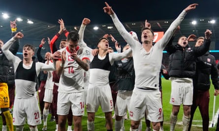 Poland celebrate after defeating Wales in a penalty shootout for a place at Euro 2024.