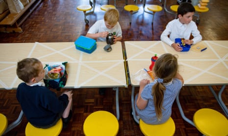 Children eating socially-distanced lunch at Kempsey primary school in Worcester in May
