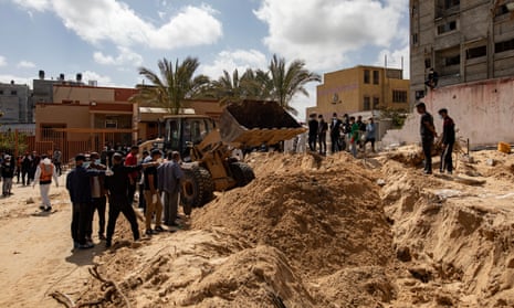 The Palestinian Civil Defense recovers 50 bodies from what they are calling a mass grave inside Nasser hospital in Khan Younis, Gaza, on 21 April 2024.