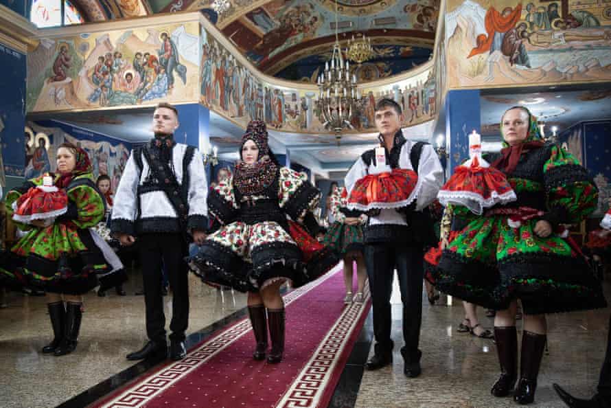 A traditional wedding ceremony in a Romanian Orthodox church in the village of Tur.