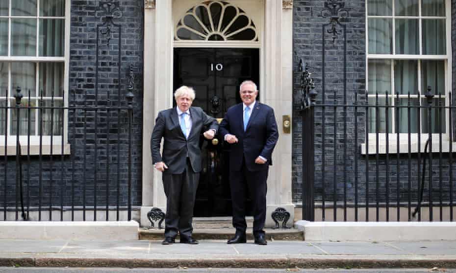 Boris Johnson and Scott Morrison celebrate a trade deal between their two countries in June 2021.