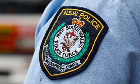 A NSW police logo on a police officers shirt