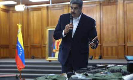Venezuela’s President Nicolás Maduro shows captured military equipment from the armed incursion at Miraflores Palace in Caracas, on Monday.