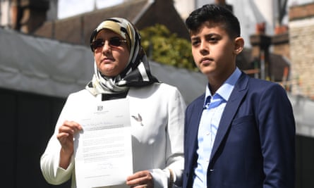 Fatima Boudchar and her son Abderrahim outside parliament in London