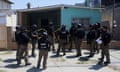Mexico security forces outside a house where a drug trafficking tunnel was discovered in 2022 that goes under the US-Mexico border between Tijuana, Mexico, and the San Diego area.