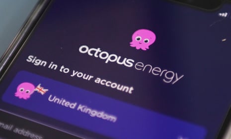 A photo illustration shows the app for Octopus Energy displayed on a mobile phone.