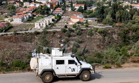 A Unifil armoured vehicle in Lebanon across the border from Metula (in background)