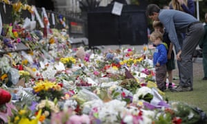 Mourners lay flowers on a wall for the 51 victims of the Christchurch massacre, allegedly conducted an Australian white supremacist. The Asio director general has warned about the growing threat from rightwing extremists in Australia.