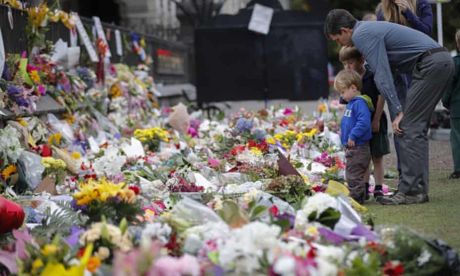 Mourners lay flowers on a wall for the 51 victims of the Christchurch massacre, allegedly conducted an Australian white supremacist. The Asio director general has warned about the growing threat from rightwing extremists in Australia. 