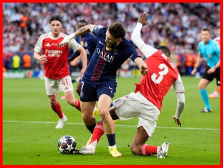 Paris Saint-Germain’s Khvicha Kvaratskhelia (left) is fouled by Arsenal’s Cristhian Mosquera resulting in a penalty.