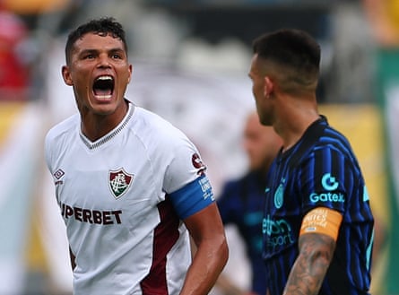 Thiago Silva celebrates after Hércules scored Fluminense’s second goal as Inter Milan's Lautaro Martinez looks on.