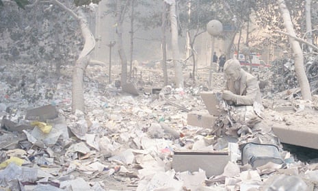 Wreckage of a city … a detail from Jeff Mermelstein’s shot of a statue in New York on the day of the 9/11 attacks.