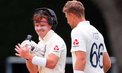 Ollie Pope congratulates teammate Joe Root for his double century, as the pair forged a partnership of 193.