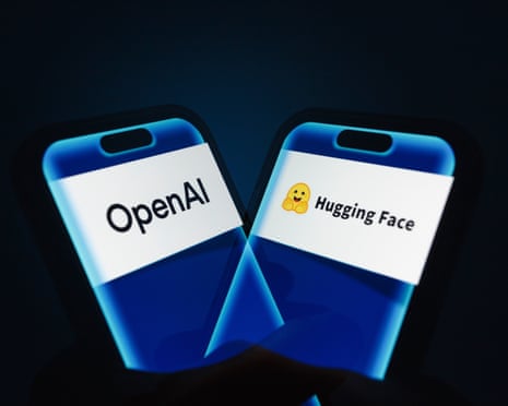 A hand holds a smartphone displaying the logos of OpenAI and Hugging Face