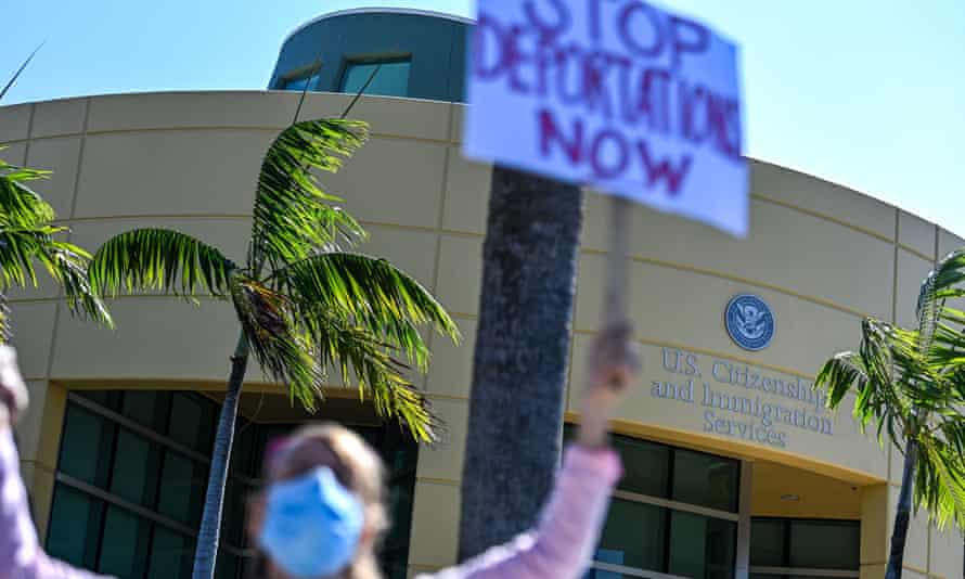 Demonstrators protest outside the US Citizenship and Immigration Service office in Miami, on February 20, 2021, demanding that the administration of US President Joe Biden cease deporting Haitian immigrants back to Haiti.