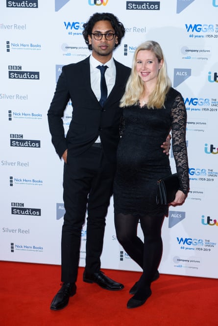 Gunaratne with their wife, a documentary maker, at an awards ceremony in London, January 2019
