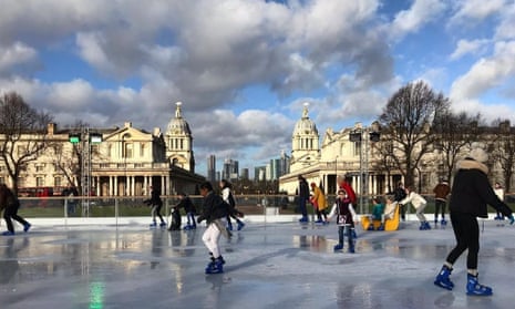 The Greenwich park rink with views to Canary Wharf, London, UK