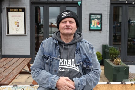Portrait of Hipkins in woolly hat and denim jacket.