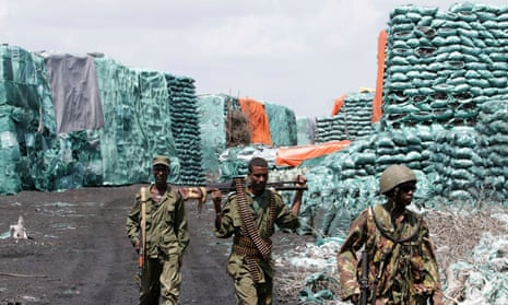 Kenya Defence Forces at a charcoal depository formerly under the control of al-Shabaab militants.