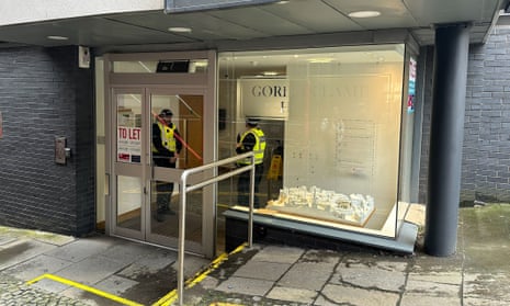 Police officers at the headquarters of the Scottish National party (SNP) in Edinburgh.