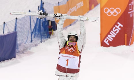 Mikaël Kingsbury of Canada celebrates winning the moguls gold medal.