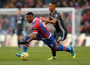 Ayew passes Tielemans before he’s tripped.