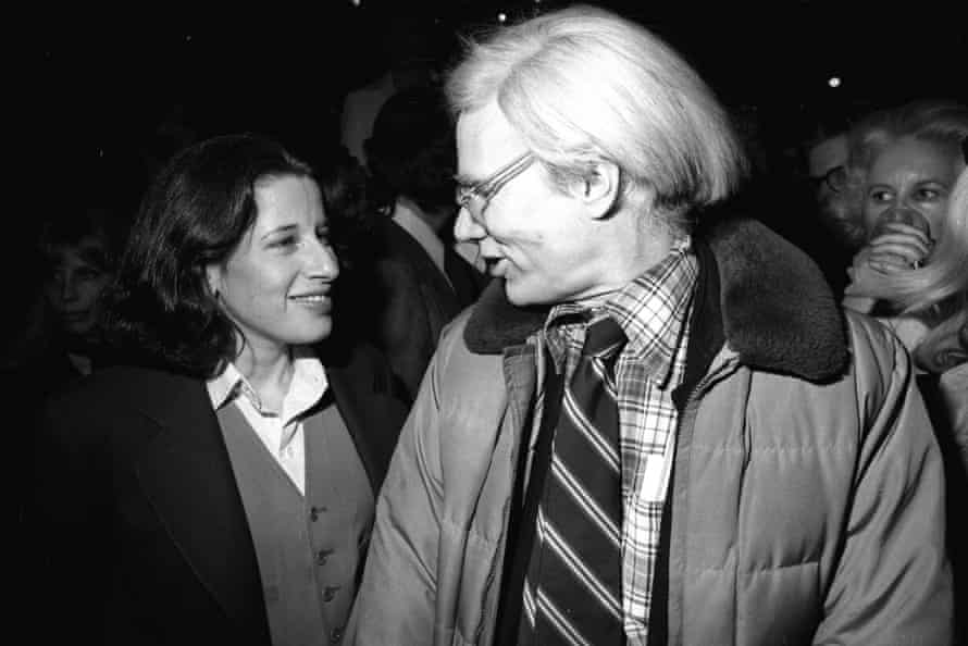 With Andy Warhol at a New York party, 1977.