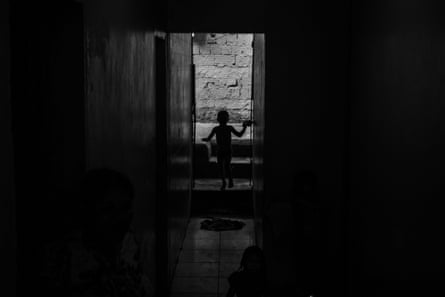 A boy in a doorway