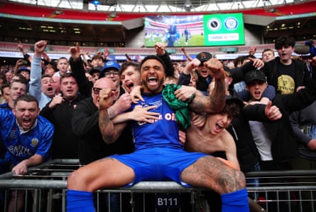 Tobi Adebayo-Rowling soaks up promotion with the Rochdale fans