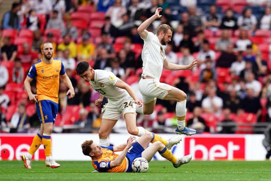 Mansfield 0-3 Port Vale: League Two playoff final – live! | League Two 3 Mansfield Town’s Stephen Quinn (on floor) tackles Port Vale’s two goalscorers, Kian Harratt (centre) and James Wilson (right.