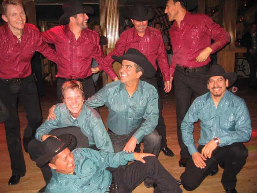 Rick Dominguez, back row, second from left, was part of the dance group LA Wranglers that performed at Oil Can Harry’s in 2012. The bar closed permanently in January.