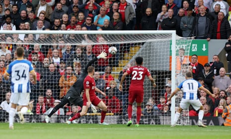Leandro Trossard beats Alisson to complete his hat-trick.