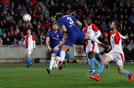 Chelsea’s Marcos Alonso power a header into the corner.