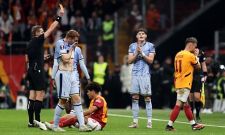 Will Lankshear is shown a red card in the second half.