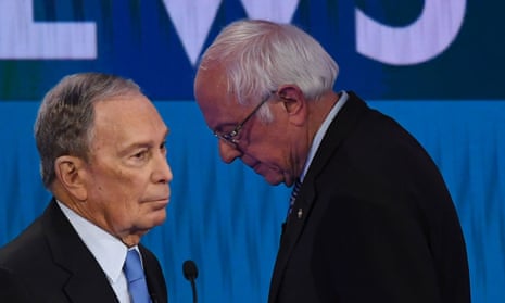 Mike Bloomberg and Bernie Sanders speak during a break in the ninth Democratic primary debate of the 2020 presidential campaign season in Las Vegas.