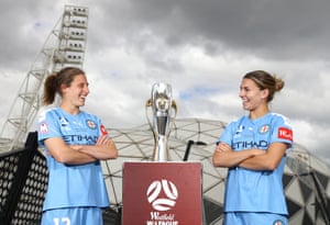 Rebekah Stott and Steph Catley of Melbourne City with the flamin’ W-League trophy.