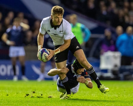 Beauden Barrett is tackled by Scotland’s Darcy Graham