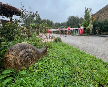 Concrete snails guard the entrance of Ball\’s snail farm in Ribchester