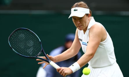 Lulu Sun plays a shot against Donna Vekic