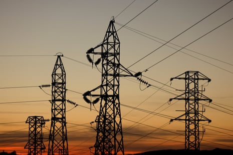 Power lines connecting pylons of high-tension electricity are seen during sunset at an electricity substation, during the blackout, on the outskirts of Ronda, Spain.