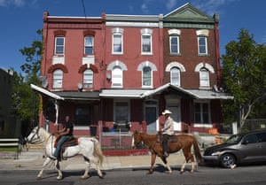 Jockey John Morris (right) and Chris Coger on the streets of Philadelphia.