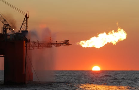 A flare from an ocean-based oil rig burning LNG