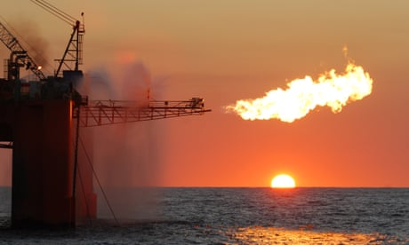 A flare from an ocean-based oil rig burning LNG as part of its exploration activities.