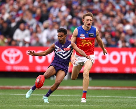 Isaiah Dudley slices through the Lions in the middle of the MCG