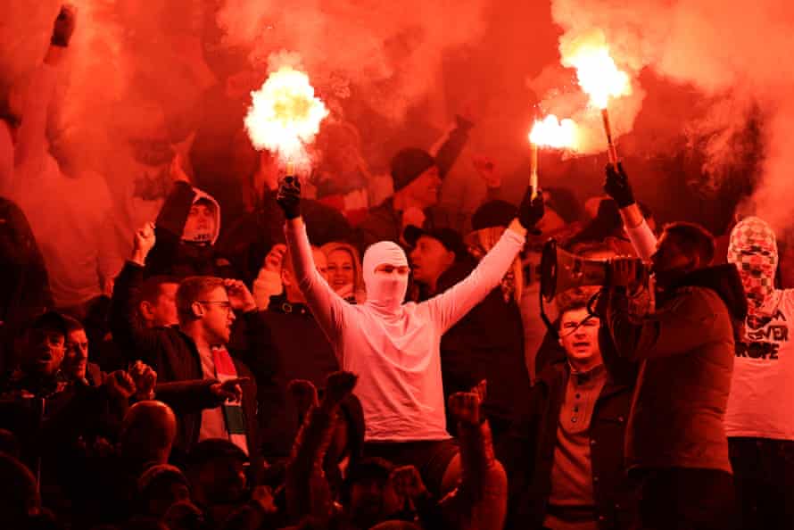 Flares in the Legia Warsaw end.