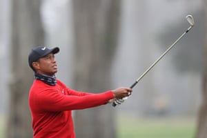 Tiger Woods plays his second shot on the fifth.
