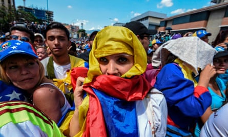 Opposition supporters listen to Juan Guaidó in Caracas on Saturday.